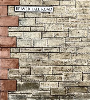 Contrasting sandstone-red and yellow-grey masonry on Beaverhall Road.