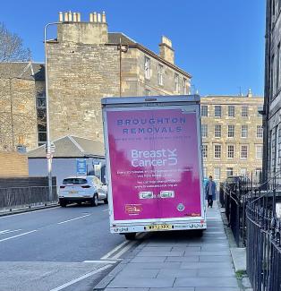 Furniture van obstructing the pavement