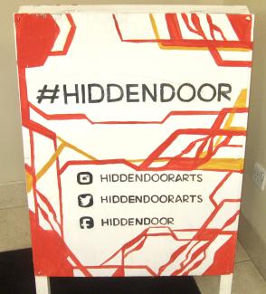Hidden Door sign