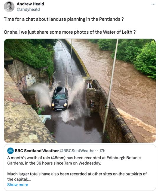 Car passing through flooded Warriston Road